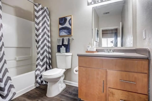 Toilet tub vanity with artwork bathroom at Madera in San Antonio Student Accommodation
