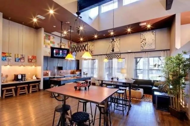 Kitchen area with seating and lounge living room. at Block 43 in Greensboro Student Accommodation
