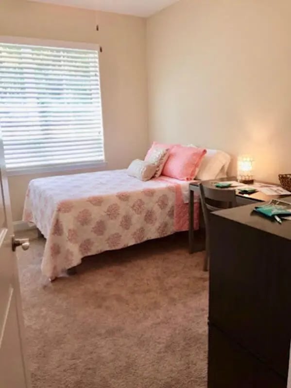 Bed desk and chair bedroom at Seahawk Cove in Wilmington Student Accommodation