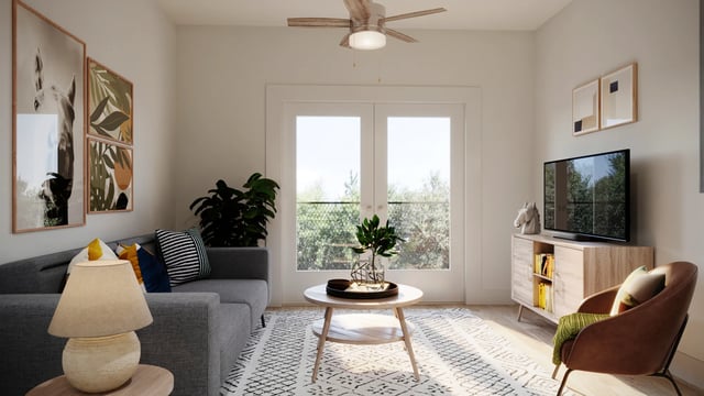 Gray couch coffee table and TV living room at Derby Row in Louisville Student Accommodation