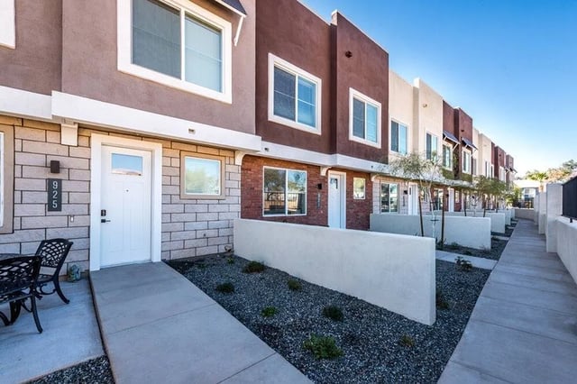 Townhouses with white doors and windows exterior at Lofts on 8th in Tempe Student Accommodation