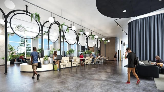 Students studying and relaxing in a communal area at The Connector in Atlanta Student Accommodation
