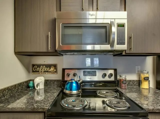 Microwave stove kettle coffee decor kitchen at The Landings at Chandler Crossings in East Lansing Student Accommodation