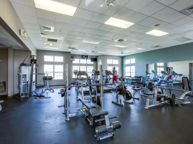 Treadmills weight machines and gym equipment gym at The Landings at Chandler Crossings in East Lansing Student Accommodation