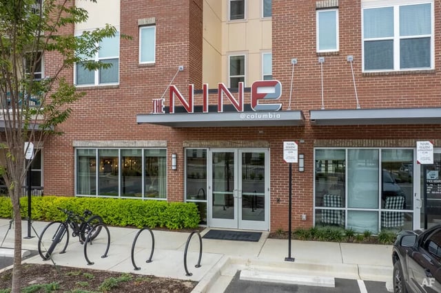 The Nine @ Columbia building exterior with bikes exterior at The Nine at Columbia in Columbia Student Accommodation