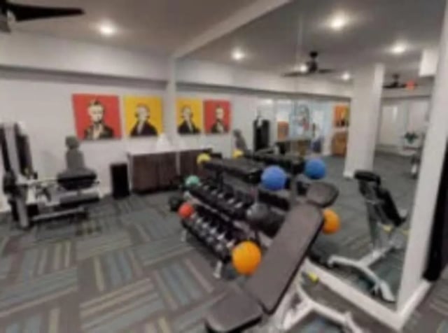 Gym equipment weights and art fitness room at Luxe Belle in Columbus Student Accommodation