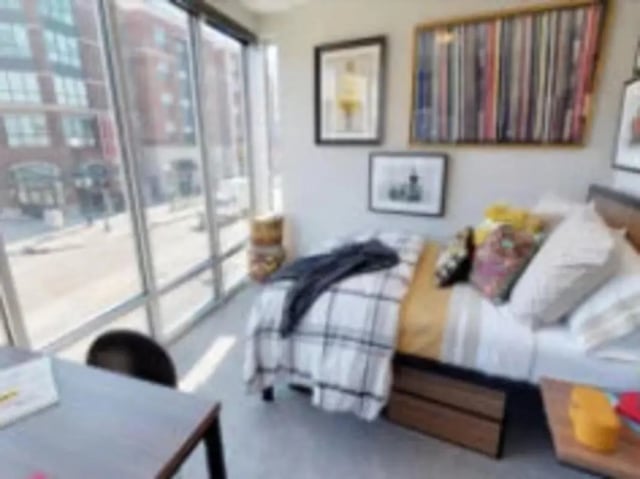 Bed desk art large window bedroom at Luxe Belle in Columbus Student Accommodation