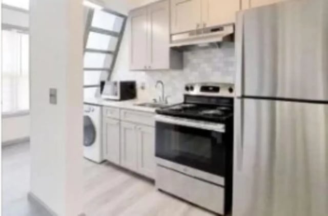 Modern kitchen with stainless steel appliances kitchen at The District at Clemson in Clemson Student Accommodation