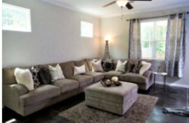 Lounge area with sectional sofa ottoman rug living room at The District at Clemson in Clemson Student Accommodation