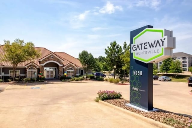 Gateway Huntsville sign building and apartments exterior at Gateway at Huntsville in Huntsville Student Accommodation