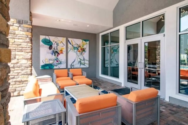 Orange seating abstract art lounge area exterior at Gateway at Huntsville in Huntsville Student Accommodation
