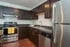 Modern kitchen with stainless steel appliances kitchen at The Den at Clemson in Clemson Student Accommodation