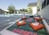 Outdoor gaming area with beanbags and buildings exterior at The Den at Clemson in Clemson Student Accommodation