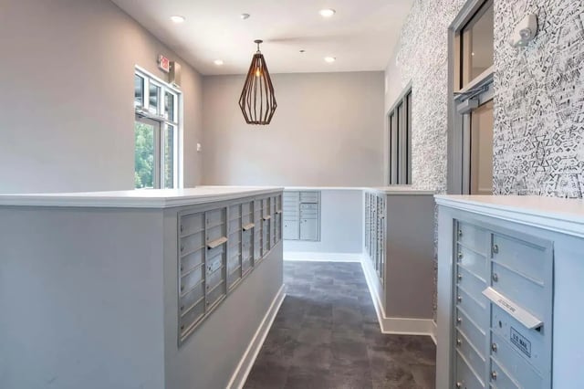 Mailboxes hallway with patterned wallpaper exterior at Eastern on 10th in Greenville Student Accommodation