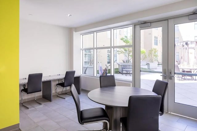 Desk chairs and a round table common area at 200 Edgewood in Atlanta Student Accommodation