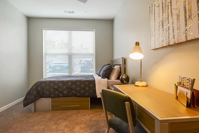 Bed desk lamp globe artwork study bedroom at The Lookout on Cragmor in Colorado Springs Student Accommodation