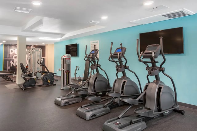 Elliptical machines exercise bikes weight machine television gym at Social28 in Gainesville Student Accommodation
