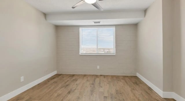 Empty room with window and ceiling fan bedroom at Mint Urban Infinity in Denver Student Accommodation