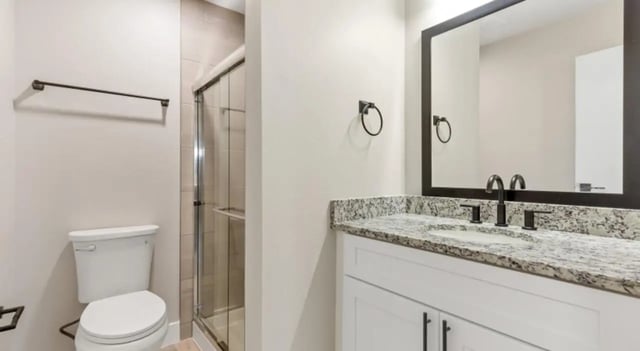 Toilet shower and vanity bathroom at Mint Urban Infinity in Denver Student Accommodation