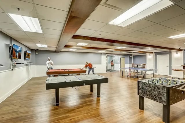 Pool tables ping pong foosball game room at Dwell The Towers on State in Madison Student Accommodation