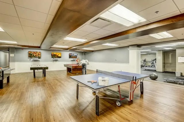 Ping pong table and pool table recreation room at Dwell The Towers on State in Madison Student Accommodation