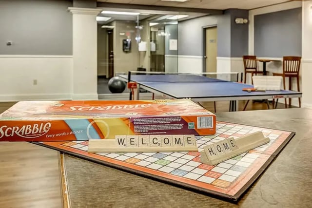 Scrabble game and ping pong table recreation area at Dwell The Towers on State in Madison Student Accommodation