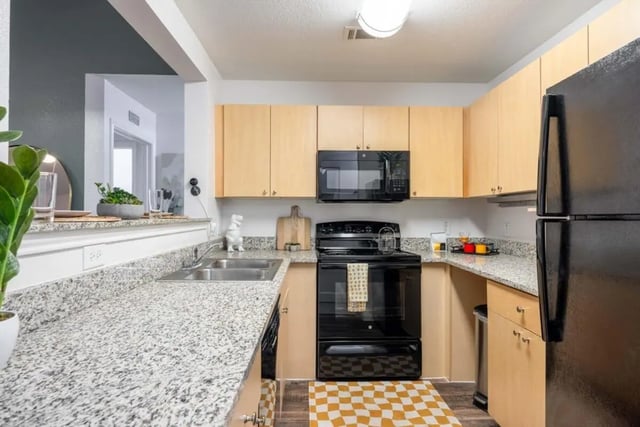 Kitchen with oven refrigerator sink cabinets kitchen at Cabana Beach San Marcos in San Marcos Student Accommodation