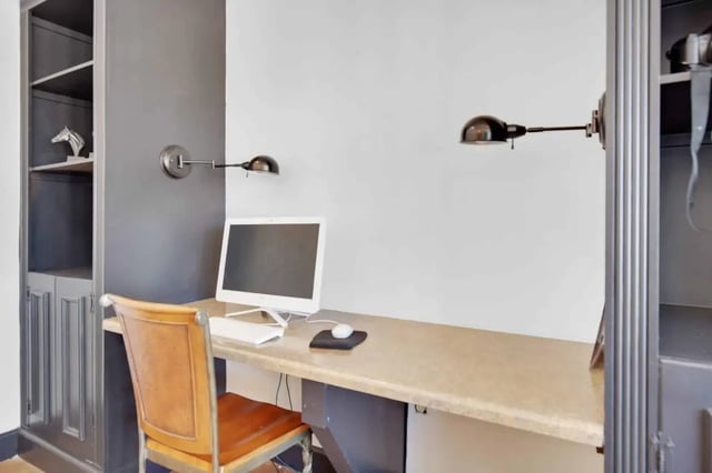 Desk with computer and chair Study Area at The Arch Troy in Troy Student Accommodation