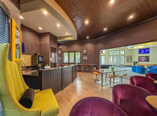 Bar coffee machine pool table lounge area lounge at NXNW in Tallahassee Student Accommodation