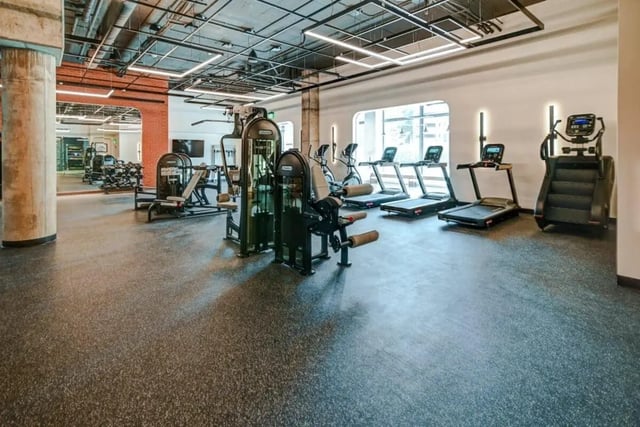 Weight machines treadmills steppers gym area at Chapter at Madison in Madison Student Accommodation
