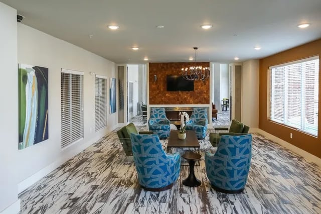 Chairs and fireplace in lounge area at Douglas Heights in Chattanooga Student Accommodation