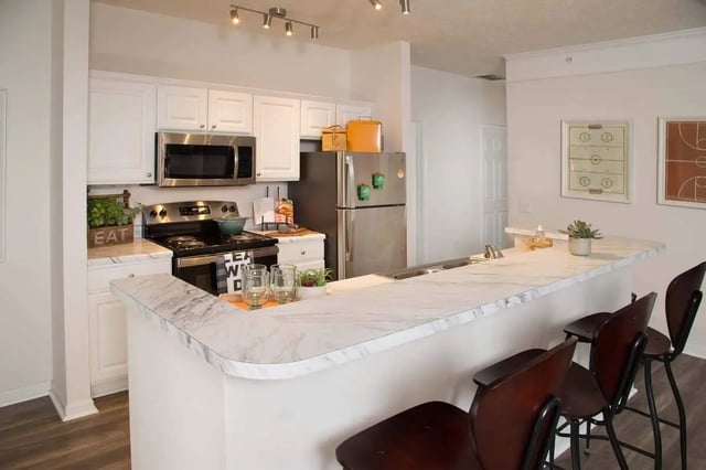 Modern kitchen with island and stools kitchen at Quarry Trail in Knoxville Student Accommodation