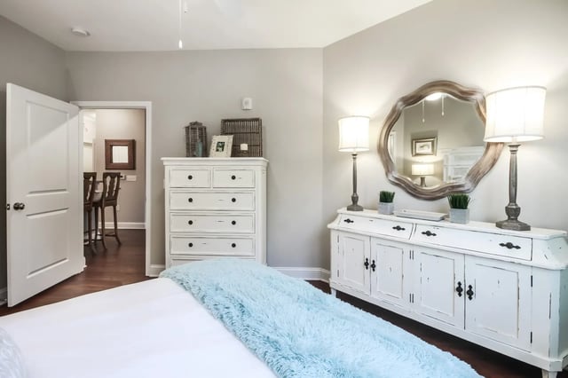 White dresser mirror lamps bedside buffet bedroom at Sweetwater in Charleston Student Accommodation