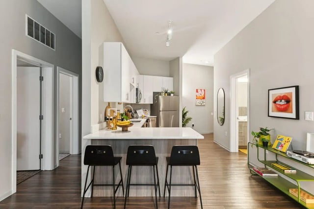 Bar stools and kitchen counter area kitchen at Paloma at University City in Philadelphia Student Accommodation