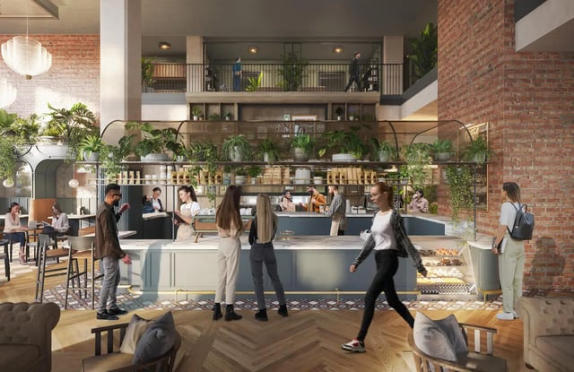Interior common area with plants and seating lounge at Rambler Columbus in Columbus Student Accommodation