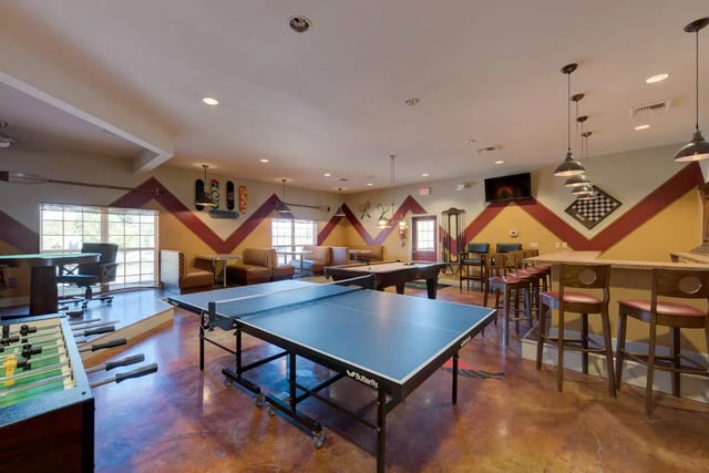 Ping pong table pool table lounge area living room at The Grove at Cheney in Cheney Student Accommodation