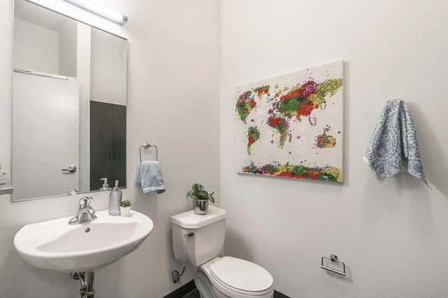 Sink toilet map artwork and towel bathroom at Arena District in Eugene Student Accommodation