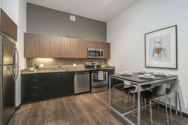 Modern kitchen with dining table and artwork kitchen at Arena District in Eugene Student Accommodation