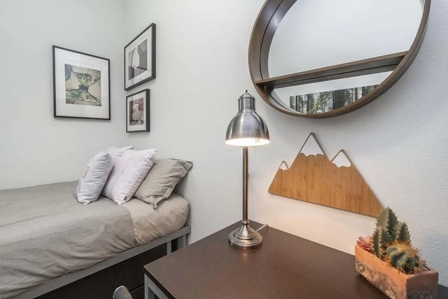 Bed desk lamp mirror mountain art framed art bedroom at Arena District in Eugene Student Accommodation