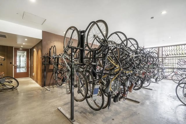 Numerous bikes on a rack exterior at Arena District in Eugene Student Accommodation