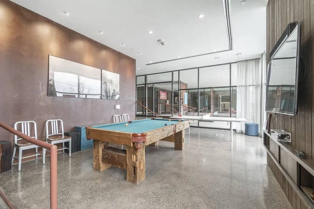 Pool table chairs and television common area at Arena District in Eugene Student Accommodation