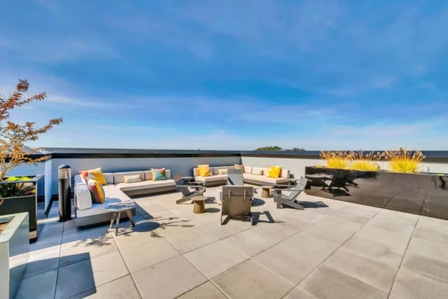 Outdoor lounge seating with potted plants and sky exterior at Chapter at Eugene in Eugene Student Accommodation