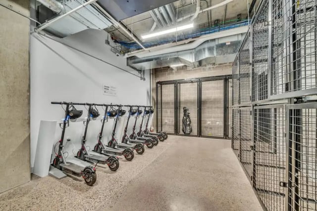Electric scooters and storage lockers bicycle storage area at Chapter at Eugene in Eugene Student Accommodation
