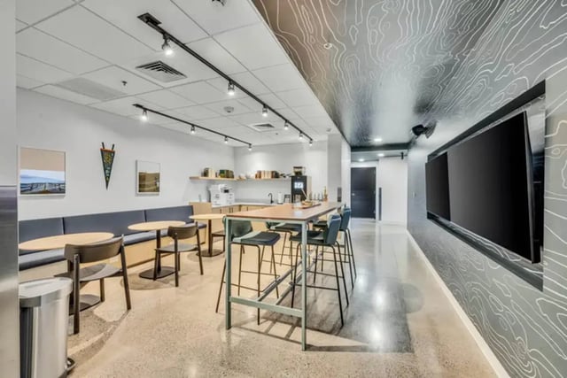 Long table with chairs coffee maker study area at Chapter at Eugene in Eugene Student Accommodation