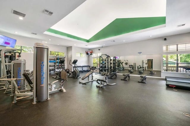 Weight machines treadmills and benches fitness center at The Wilde Raleigh in Raleigh Student Accommodation