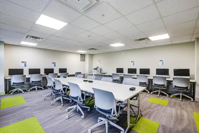 Computers chairs and a long table Study area at Rush Charlotte in Charlotte Student Accommodation