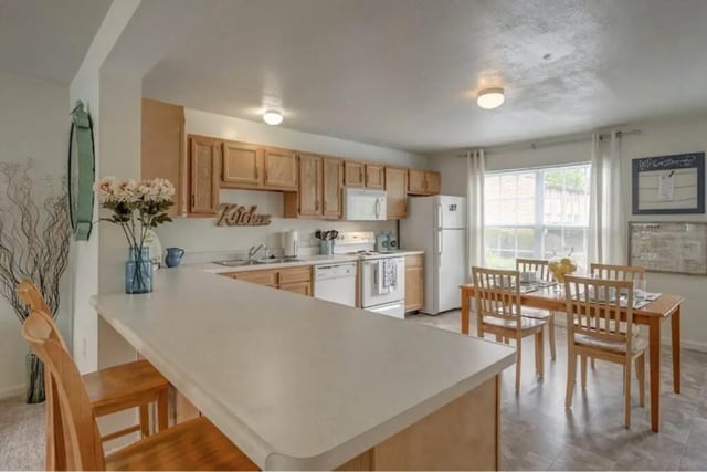 Kitchen with counter and dining table kitchen at Copper Beech Townhomes - Radford in Radford Student Accommodation