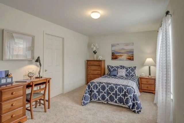 Desk bed dresser with lamp bedroom at Copper Beech Townhomes - Radford in Radford Student Accommodation