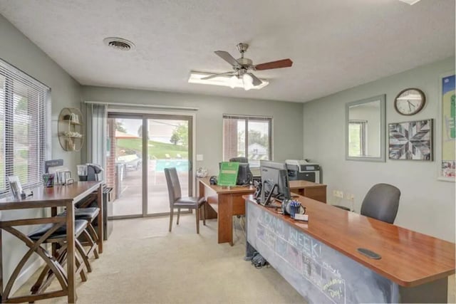 Desks computers printer chairs with pool view office at Copper Beech Townhomes - Radford in Radford Student Accommodation