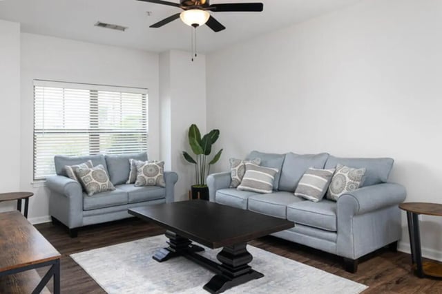 Two light blue couches and coffee table living room at Traditions Oxford Apartments in Oxford Student Accommodation